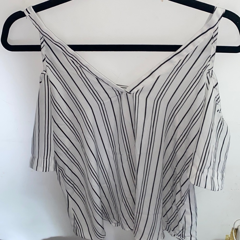 White with black striped blouse.